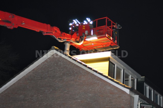 Brand in schoorsteen van woonhuis Baarsweg Hoogvliet