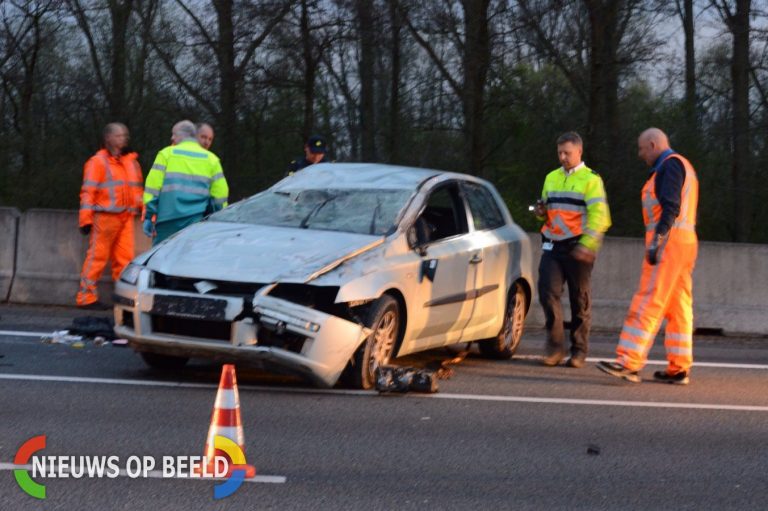 Automobilist slaat over de kop A12 Zevenhuizen