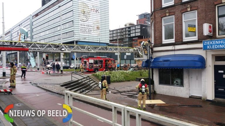 Klein brandje aan gevel Mon Cheri Westzeedijk Rotterdam