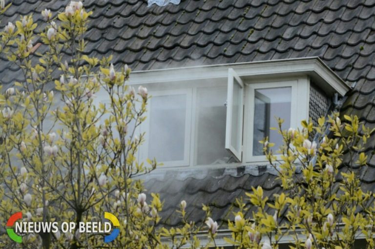 Flinke rookschade door brandje in oven Burg. Le Fevre de Montignylaan Rotterdam