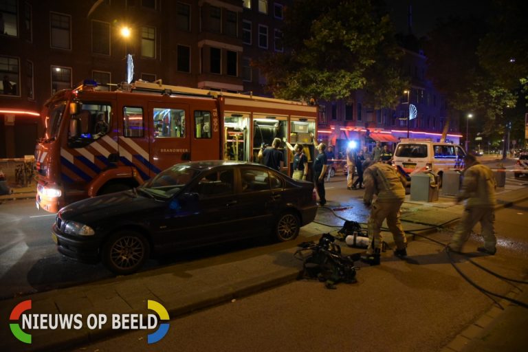 Brandweer blust felle brand in wasserette Mathenesserweg Rotterdam