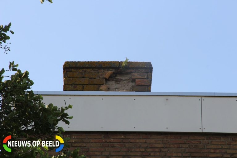 Bliksem ingeslagen in schoorsteen van flat Kerklaan Capelle aan den IJssel