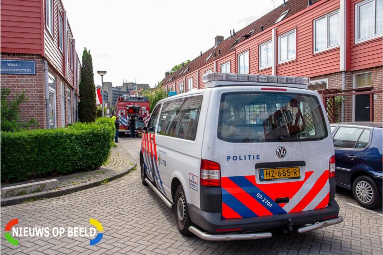 Brandweer blust brand in woning West-Pietermanstraat Rotterdam