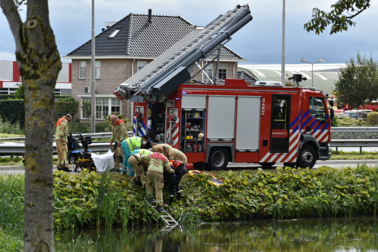 Persoon met scootmobiel raakt te water Wolfend Bergschenhoek