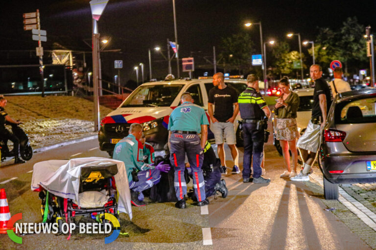 Scooterrijder gewond na aanrijding auto Stadionweg Rotterdam