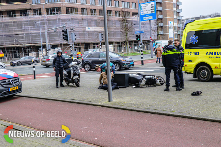 Maaltijdbezorger en voetganger komen met elkaar in botsing Lange Hilleweg Rotterdam