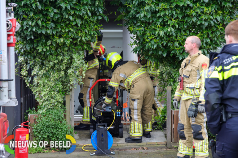 Buren voorkomen erger en blussen brand in meterkast Jan Wilspad Rotterdam