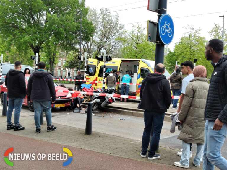 Gewonden bij aanrijding scooter met auto Vierambachtsstraat Rotterdam