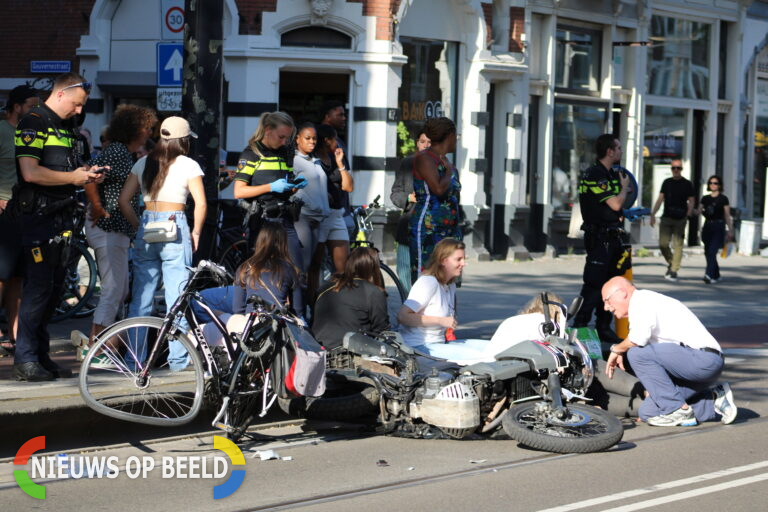 Gewonden na aanrijding tussen motor en fiets Nieuwe Binnenweg Rotterdam