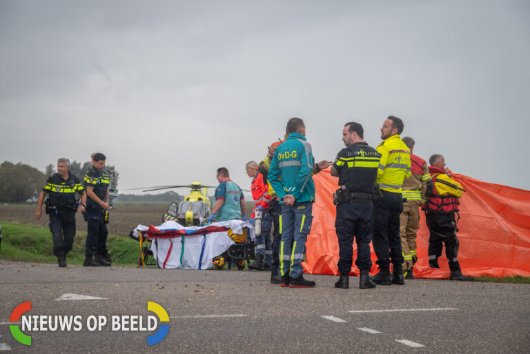 Man (38) overleden na te water raken met auto Sluisweg Vierpolders