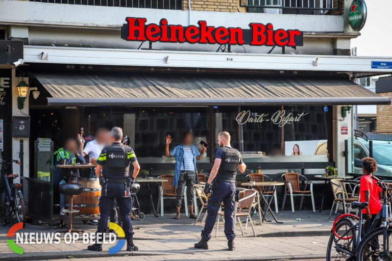 Café doorzocht na vuurwapenmelding Slinge Rotterdam